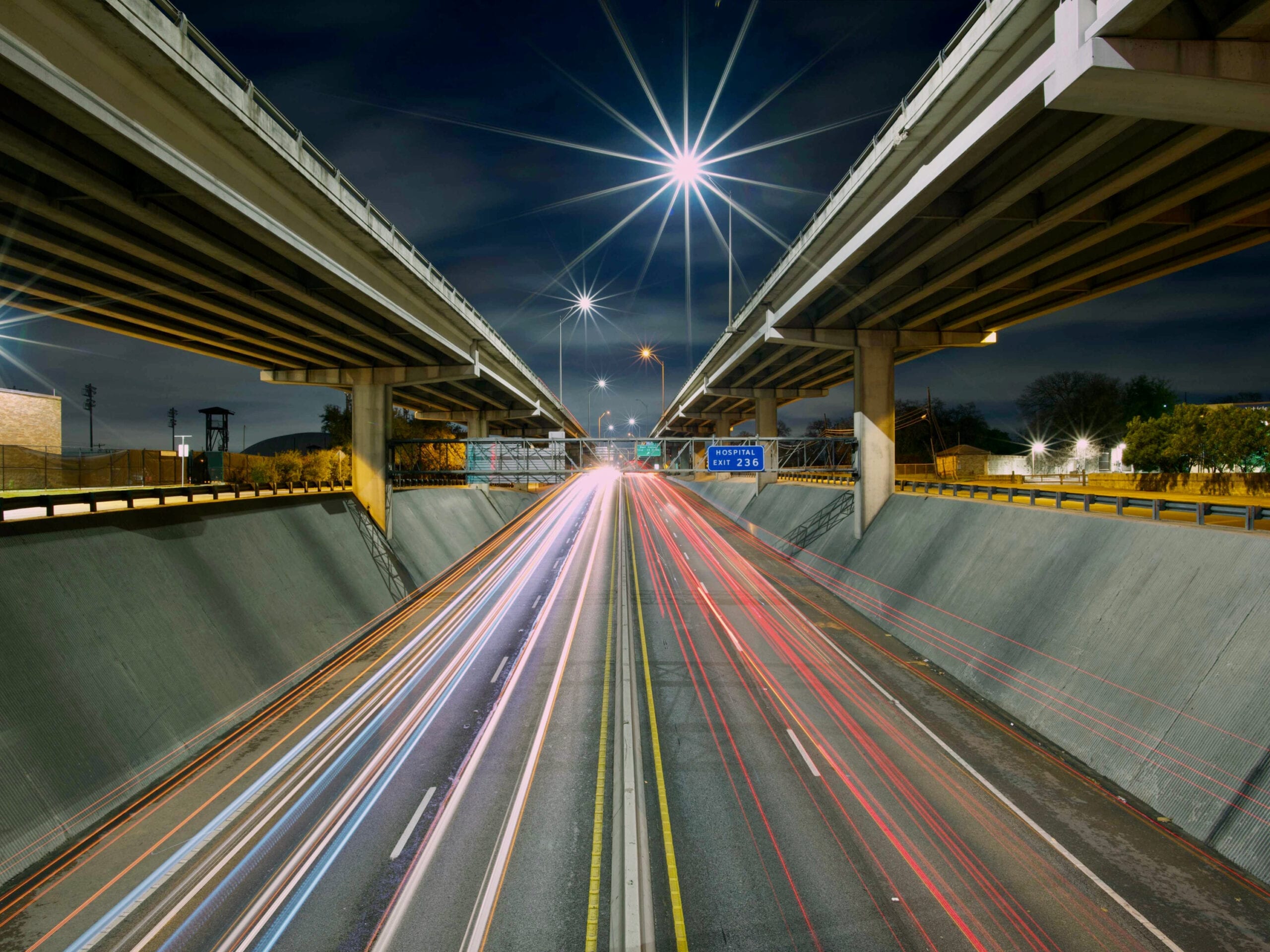 A highway at night. RDM has extensive experience in the field of transportation litigation.