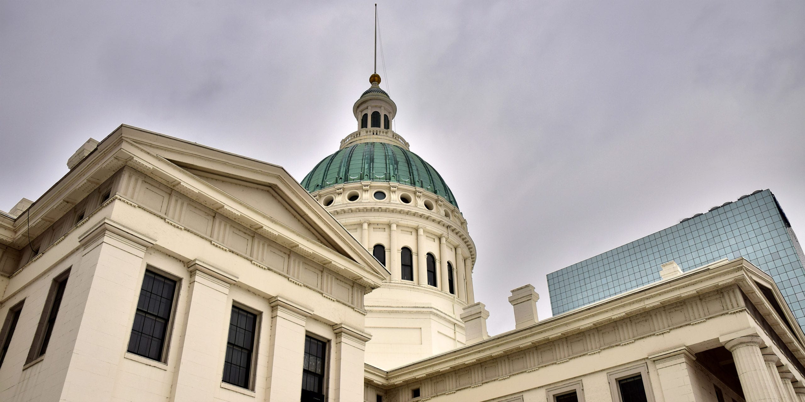 The Old Courthouse in Downtown St. Louis, with RDM's St. Louis office in the background.